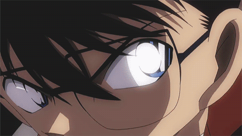 flip clock screen background of Conan the Detective kicking a football